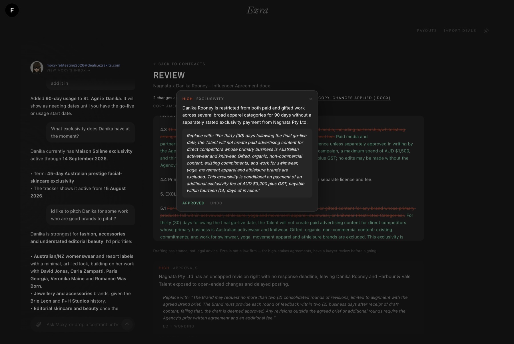 Contract review with a clause struck through and replacement wording drafted